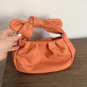 Anthropologie knotted mini bag in peach